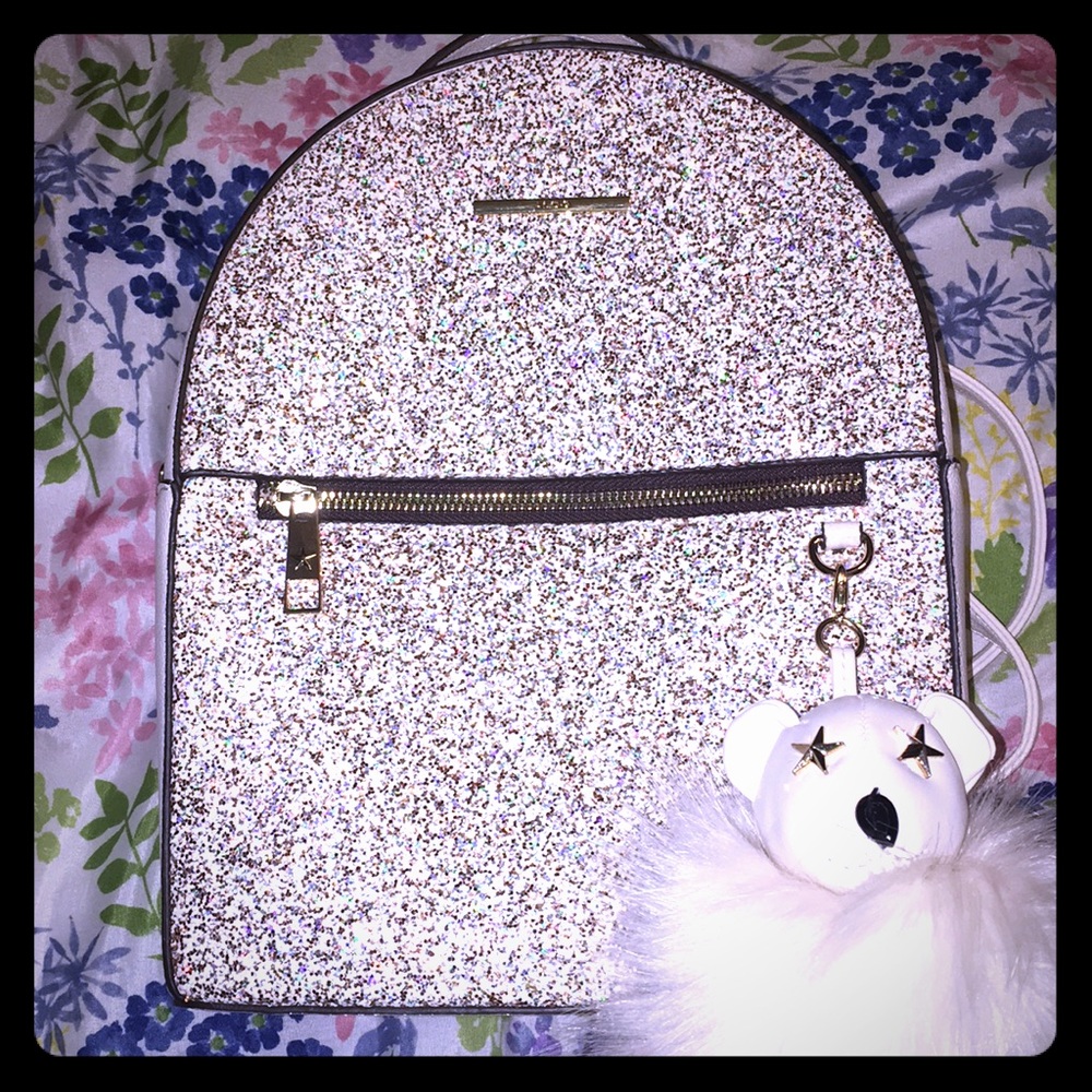 like new with tag also glitter backpack!